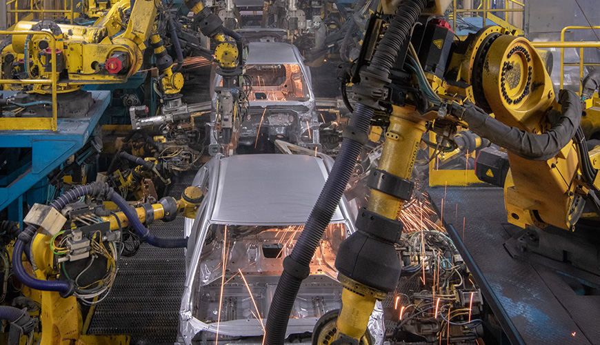 Honda Cars being welded on production line at Honda of Canada Mfg.